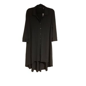 Jetset jersey knit shirt dress with 3/4 button trimmed sleeves, polo collar.